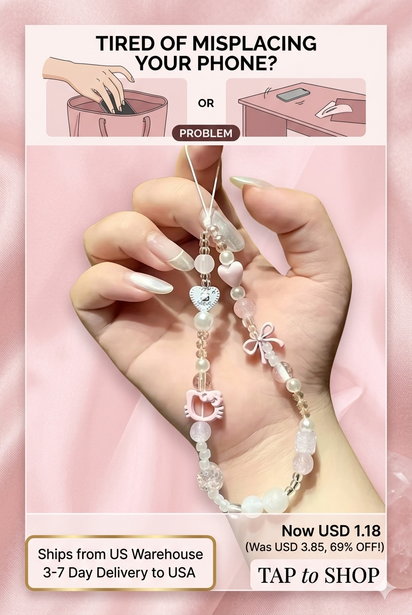 Hand holding a premium 3D pink Hello Kitty phone chain strap with white pearls and a cute ribbon lanyard against a wooden background.