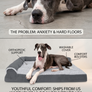 Stone gray Jumbo XL Furhaven orthopedic L-shaped chaise dog bed with plush faux fur and supportive bolsters on a living room floor.